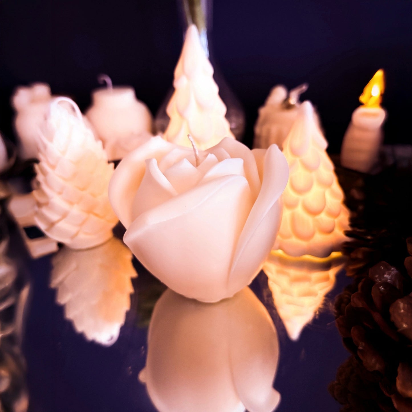 Artisan large rose candle in natural soy wax, side view highlighting layered rose petals and sculptural depth, decorative candle for romantic and cozy interiors.