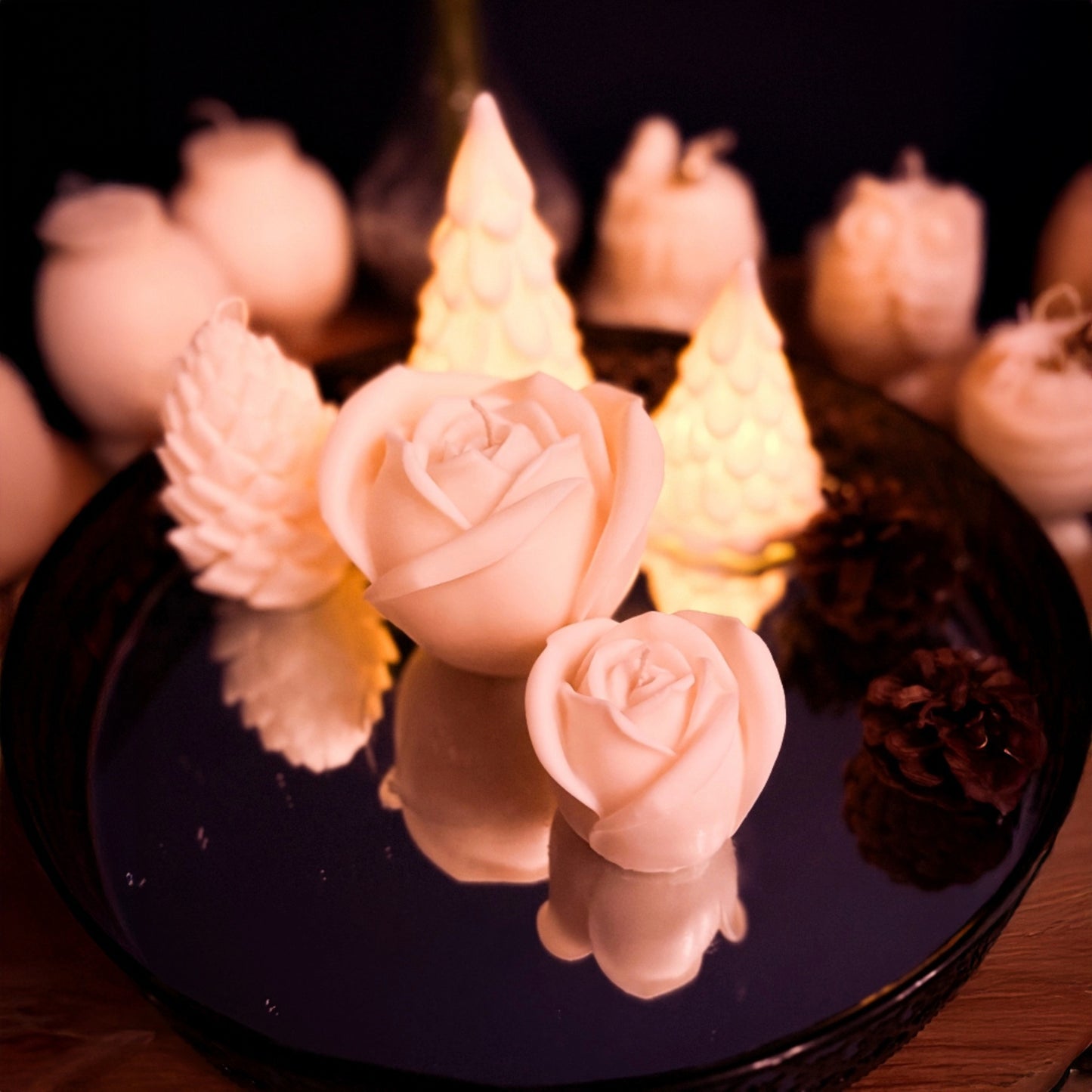 Angled top view of a handcrafted rose-shaped candle set in soy wax, large and small floral candles with smooth matte finish, perfect for elegant and romantic home decor.