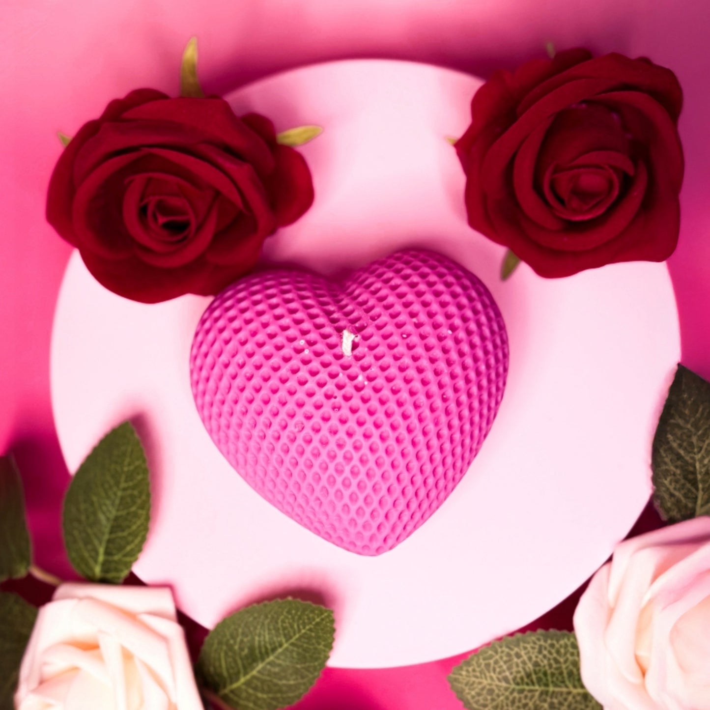 Textured heart candle made from soy wax styled for Valentine’s Day décor.