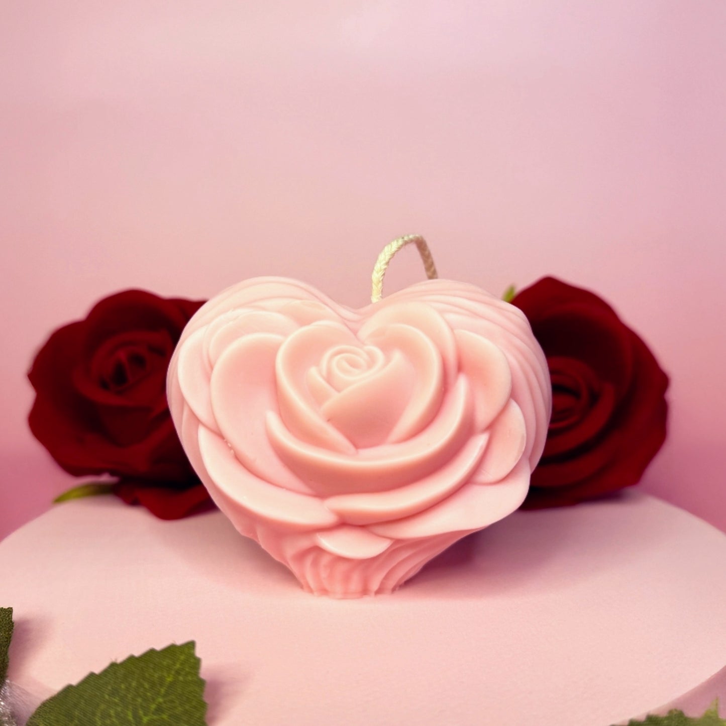 Romantic heart-shaped candle with rose design, Valentine’s gift candle.
