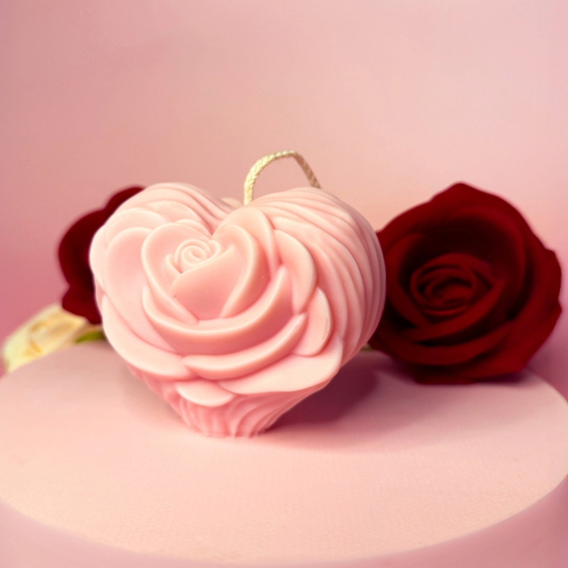 Decorative rose heart candle in soft pink color, handmade soy wax candle.